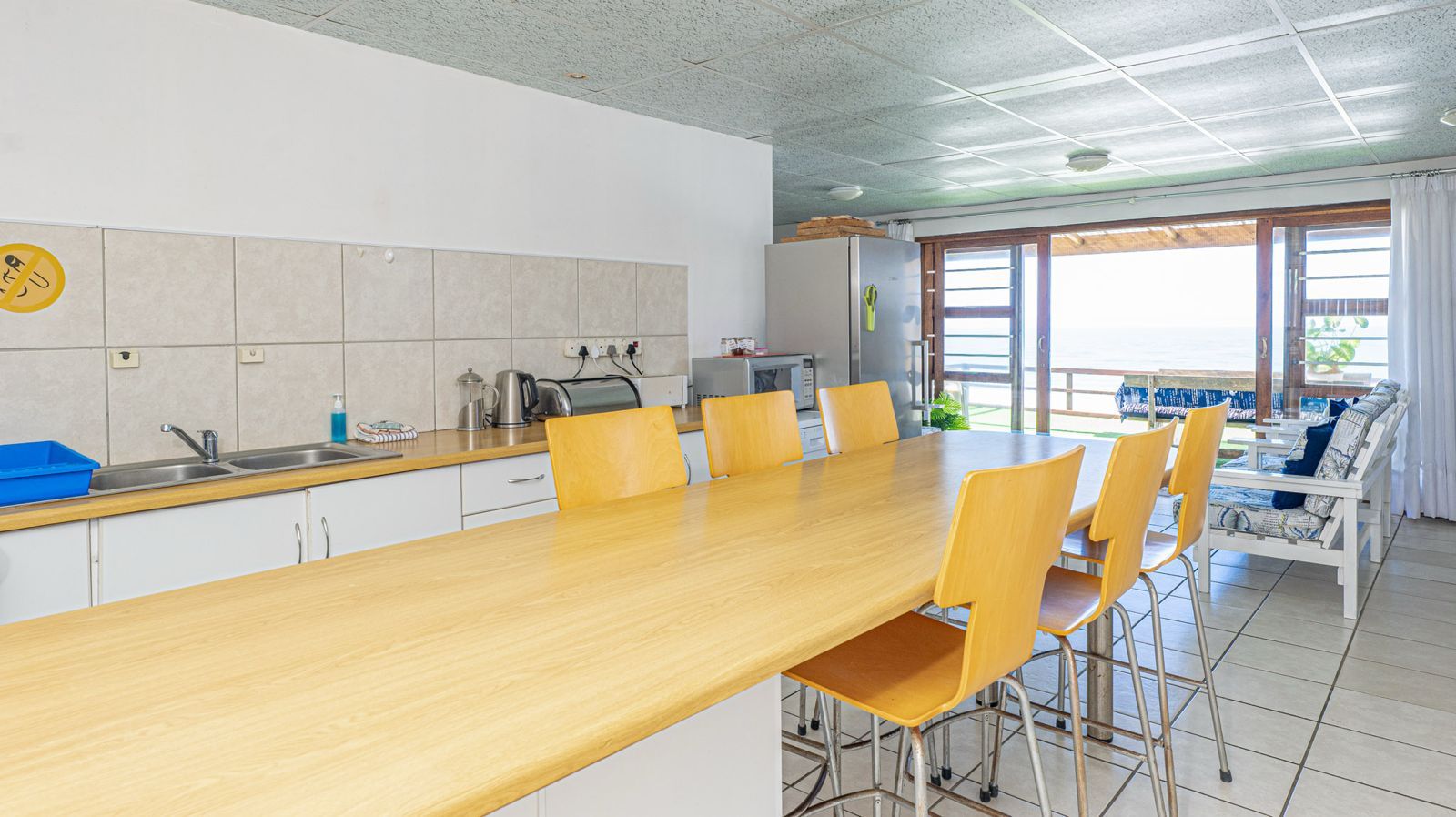 Blue Whale kitchen with breakfast counter and sea view