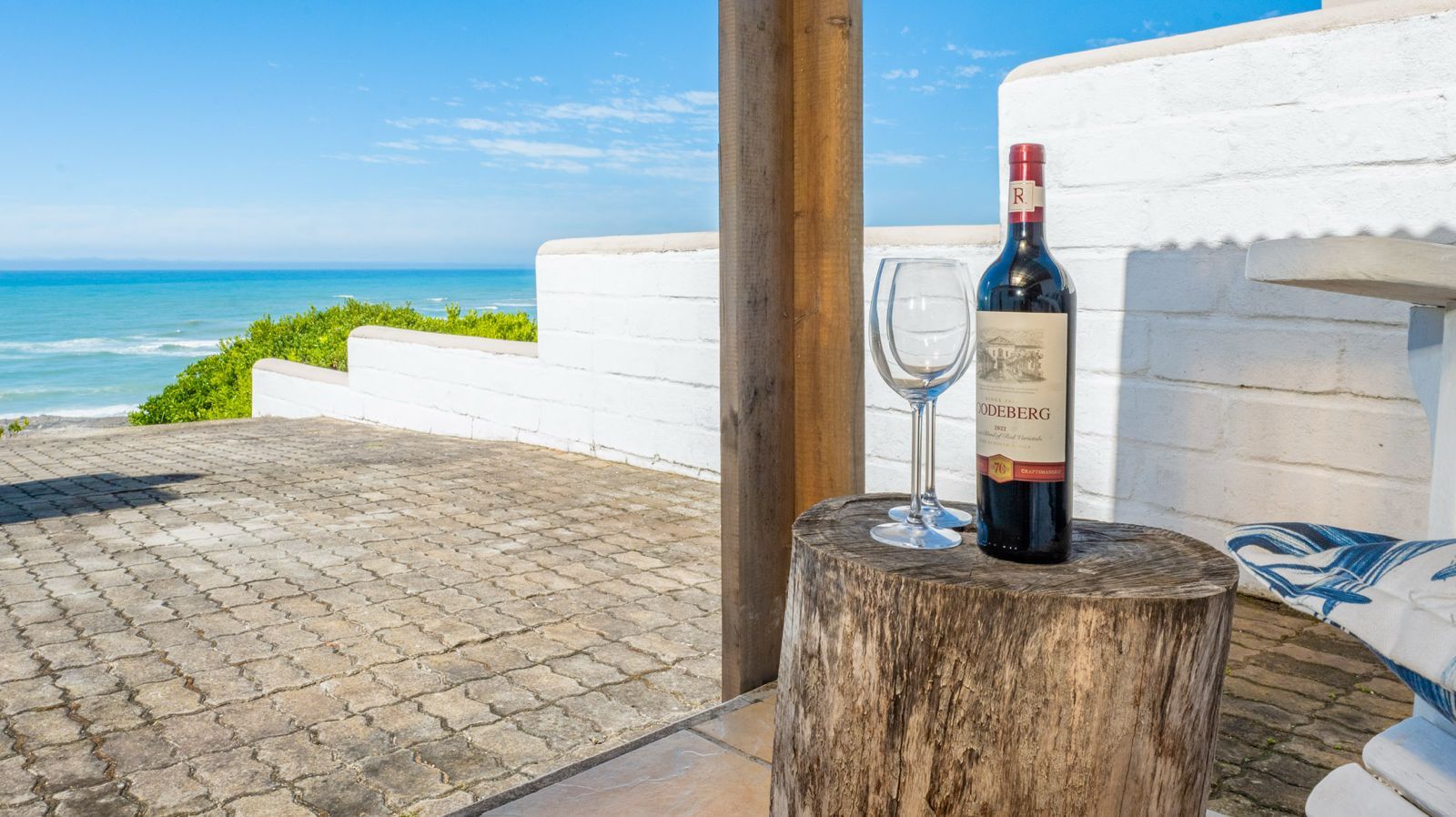 Wine on the patio with an ocean view